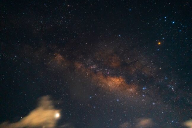 A breathtaking view of the Milky Way with vibrant stars in the night sky, perfect for wallpaper.